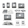 A collection of digital and print mockups is displayed, featuring various electronic devices and Royalty Free Stock Photo