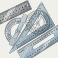 Of drafting tools including a protractor, set square, and multiple Royalty Free Stock Photo