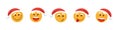 Collection of emoticons for Christmas and New Year holidays. Set the Smile Emoji icon in Red Hat Santa Claus. Royalty Free Stock Photo