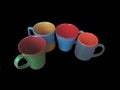 Collection of empty ethnic stylish coffee or tea cups on isolated black background. Royalty Free Stock Photo