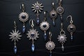 a collection of evil eye keychains on a dark textured background