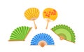 Collection Of Exquisite Asian Hand Fans, Adorned With Intricate Designs, Handles And Vibrant Colors and Patterns