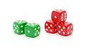 Two green dice and a stack of three red dice on a white background Royalty Free Stock Photo