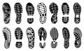 Collection of footprints human shoes silhouette. Set of shoe soles print. Different vector footprints men women sneakers Royalty Free Stock Photo