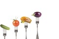 collection of forks with vegetables isolated on a white background. With space for text