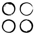 Set of 4 black grunge coffee cup stains. Vector beverage ring marks isolated on white background Royalty Free Stock Photo