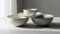 Collection of four ceramic bowls stacked in a minimalist arrangement displayed Royalty Free Stock Photo