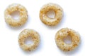 Collection of four honey cheerios isolated on white. Royalty Free Stock Photo