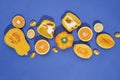 Collection of fresh yellow fruit and vegetables on the blue background Royalty Free Stock Photo