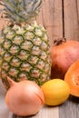 Collection of fruit and vegetables. Pineapple, lemon, grapefruit, onion, pumpkin Royalty Free Stock Photo