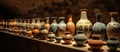 A collection of glass bottles on a wooden table for still life photography Royalty Free Stock Photo