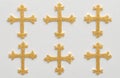 Collection of gold crosses on white backgrouned Royalty Free Stock Photo