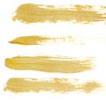 Collection of hand drawing golden paint strokes