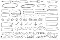 Collection of hand-drawn doodle elements including arrows, banners, checkmarks, and decorative swirls Royalty Free Stock Photo