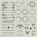 Collection of hand drawn wedding design elements, arrows, circles boders hearts and feathers.