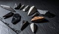 Primitive Tools and Arrowheads on Slate Royalty Free Stock Photo