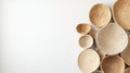 Collection of handwoven baskets on minimalistic wall display in natural light, AI Generative Royalty Free Stock Photo