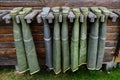 Collection of hip waders hanging up drying outside on a rustic wood cabin Royalty Free Stock Photo