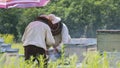 Collection of honey in the apiary