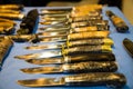 Collection of hunting knives, different in size Royalty Free Stock Photo