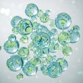 Abstract cluster of translucent spheres with green and blue tints Royalty Free Stock Photo