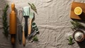 A collection of kitchen utensils is arranged on a textured beige fabric surface. Items include a Royalty Free Stock Photo