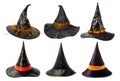 Collection of leather and fabric black witch\'s hats of different styles isolated on white
