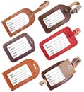 Collection of leather luggage tags isolated on white Royalty Free Stock Photo
