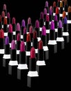 Multiple lipsticks arranged on a solid background. Ideal visual for themes related to makeup, beauty products, cosmetics, and fash Royalty Free Stock Photo