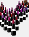 Multiple lipsticks arranged on a solid background. Ideal visual for themes related to makeup, beauty products, cosmetics, and fash Royalty Free Stock Photo