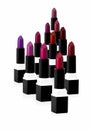 Multiple lipsticks arranged on a solid background. Ideal visual for themes related to makeup, beauty products, cosmetics, and fash Royalty Free Stock Photo