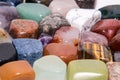 Collection of many kinds of polished gemstones originating from all continents isolated Royalty Free Stock Photo