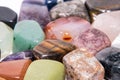 Collection of many kinds of polished gemstones originating from all continents isolated Royalty Free Stock Photo