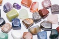 Collection of many kinds of polished gemstones originating from all the continents isolated Royalty Free Stock Photo