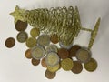 collection of mixed euro coins scattered on a white surface. The image shows various denominations in different metallic Royalty Free Stock Photo