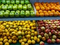 collection of multiple fruits such as local orange and multiple kind of apple in the market showcase