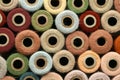 Collection of Natural Colored Vintage Yarn Spools Background Royalty Free Stock Photo