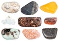 Set of various polished stones isolated on white