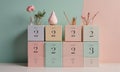 collection nine colorful boxes, each with number and small pink flower, is arranged in grid-like pattern Royalty Free Stock Photo