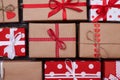 Collection of nine wrapped gift boxes of different color and shape