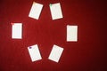 Collection of note papers pinned on a red board ready for filling in quotes. Royalty Free Stock Photo