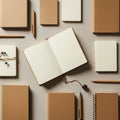 A collection of notebooks with brown and cream-colored covers is neatly arranged on Royalty Free Stock Photo
