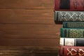 Collection of old books on shelf. Space for text Royalty Free Stock Photo