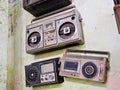 A collection of old radios and tape recorders. Retro outdated portable stereo boombox radio receiver with cassette recorder from Royalty Free Stock Photo