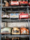 Collection of old and rusty pedal cars for kid Royalty Free Stock Photo