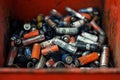 Collection of old used batteries of different sizes about electric waste ,toxic materials from causing harm to Royalty Free Stock Photo