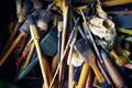 A collection of old and used paintbrushes and tools