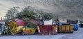 Collection of old used waste skips Royalty Free Stock Photo
