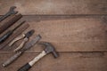 Collection of old woodworking handtools on a rough workbench wooden Royalty Free Stock Photo