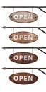 Collection of oval wooden signs. An old oval OPEN sign hangs from a wrought iron structure. Isolated on white. Blank for design Royalty Free Stock Photo